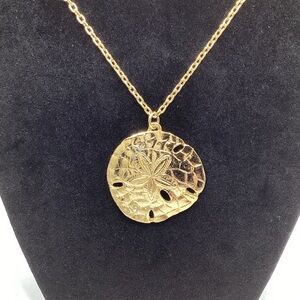 Gold Sand Dollar Pendant Necklace